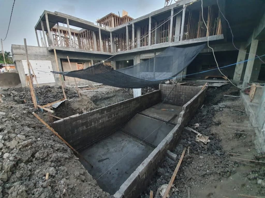 Pool construction underway at the Aura Villas project by Balitecture